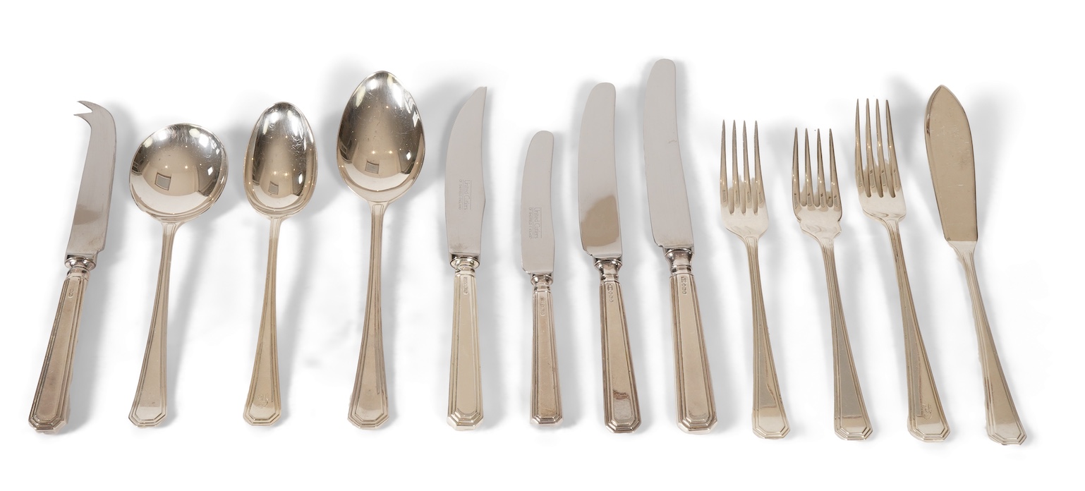 An Elizabeth II matched canteen of silver Grecian pattern cutlery for eight